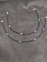 Black Bead Blue Accent Kids Rings, front view