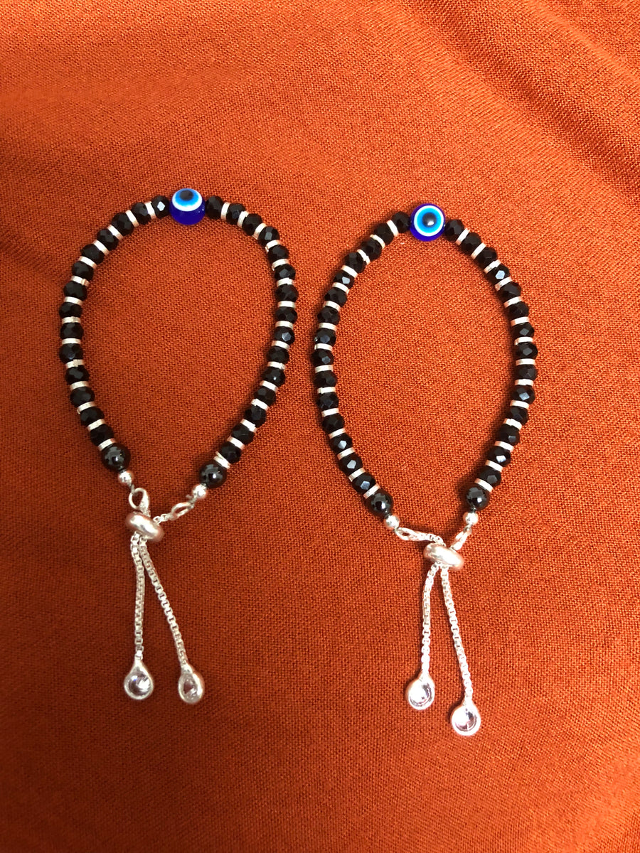 Black Bead Evil Eye Bachha Kadli, front view