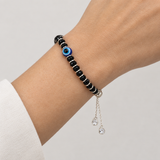 Black Bead Evil Eye Bracelet, worn lifestyle view