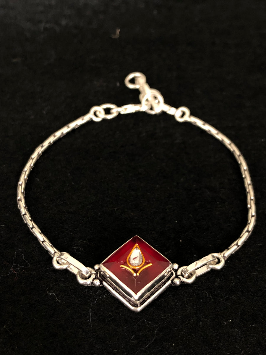 Red Enamel Diya Bracelet, angled view