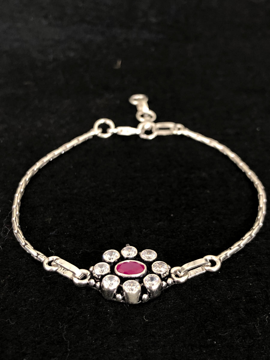 Ruby Halo Chain Bracelet, angled view