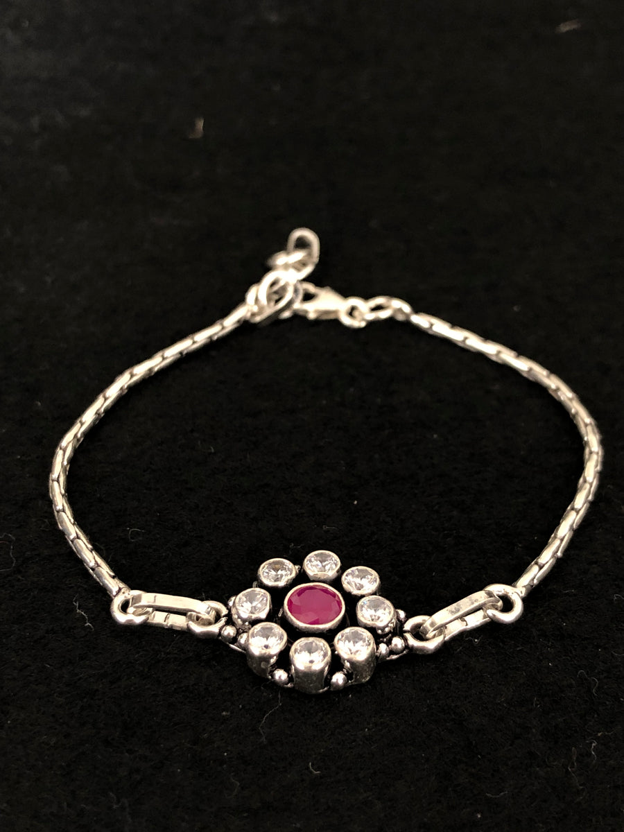 Ruby Halo Silver Bracelet, angled view
