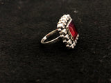 Ruby Halo Silver Ring, angled view