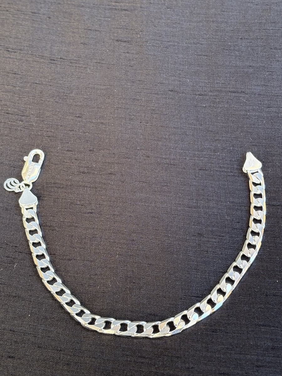 Silver-Tone Curb Chain Bracelet, angled view