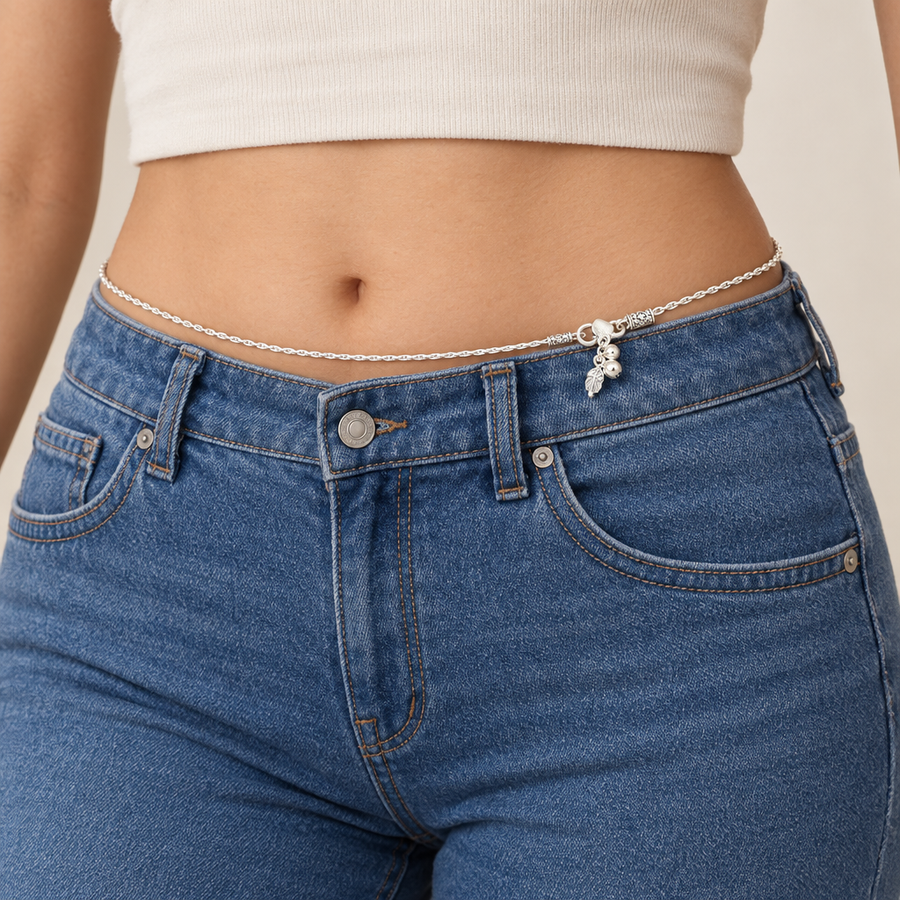 Silver-Tone Leaf-Charm Waist Chain worn over blue jeans