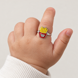 Silver Tone Red Yellow French Fries Kids Ring, worn on a one-year-old baby's index finger